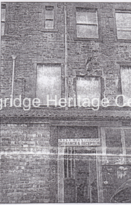 842B - Co-op building - Newspaper clipping of the side of the main building. - Unknown