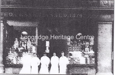 891 - Co-op building - Group of employees outside main building - Unknown