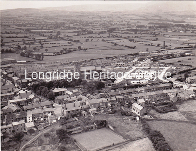 205B - Aerial Photo - Showing Dog Inn St Pauls and pre-fabs - 1946