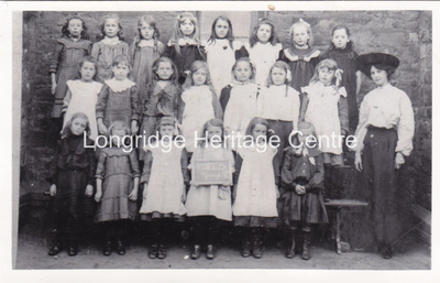 226A - Berry Lane - CofE Girls School teacher with a group of pupils - 1907