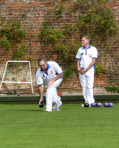 Stewart Rump gets into the groove whilst John Boult looks on.