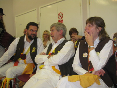Three melodeon players talking about melodeons