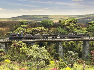 A slate train crosses Lancey Brook in Devon