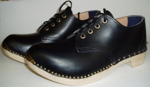 a pair of gibson style dance clogs