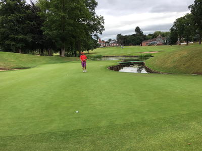 Terry 'Seve' Portway lands it on the green at the famous 10th hole...