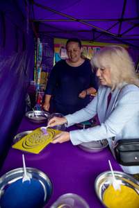 The Mayoress being artistic with Sand Art