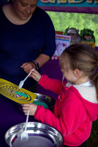 A young person trying out Sand Art