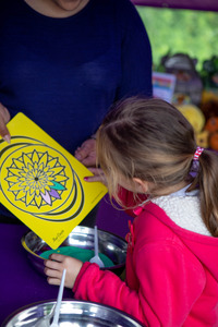 A young person trying out Sand Art