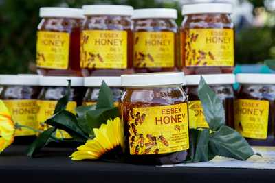 Stall selling local Honey for sale in 1lb & 1/2 lb jars from Brock Hill Honey