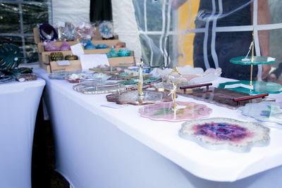 Resinbyjen	stall selling various resin items all handcrafted. Coasters, platters, serving dishes, bowls, some animal & reptile pieces, pendants & rose sprays