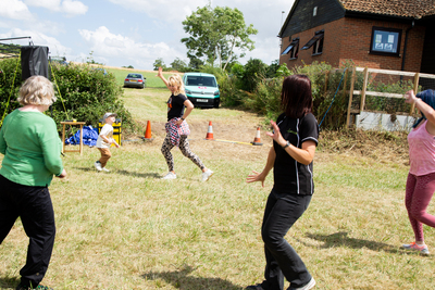 Charlene giving a Zumba demonstration - You can join her classes at our hall on a Thursday evening!