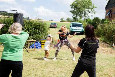 Charlene giving a Zumba demonstration - You can join her classes at our hall on a Thursday evening!