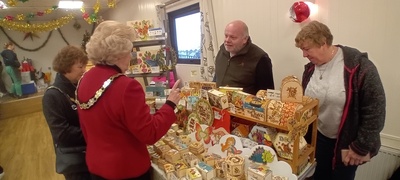 The Mayor of Chelmsford Councillor Janette Potter and Mayoress Councillor Jackie Galley  making a purchase at  Borderland Crafts