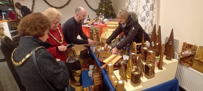 The Mayor of Chelmsford Councillor Janette Potter and Mayoress Councillor Jackie Galley purchasing from Dewin Pren Woodworking