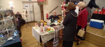 The Mayor of Chelmsford Councillor Janette Potter and Mayoress Councillor Jackie Galley chatting to Sarah Bell of Agatha Crochet