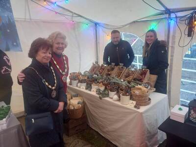 The Mayor of Chelmsford Councillor Janette Potter and Mayoress Councillor Jackie Galley posing for a photo at Waggles Raw Treats stall