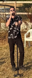 Cameron takes to the Mic