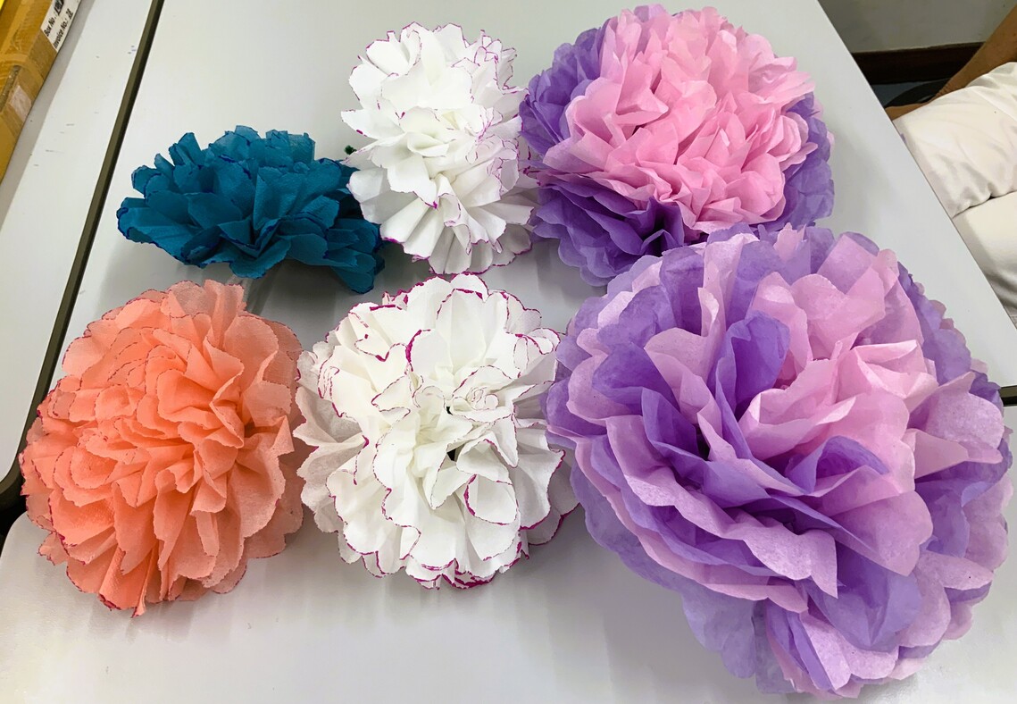 Paper flowers made during July 2025 craft sessions