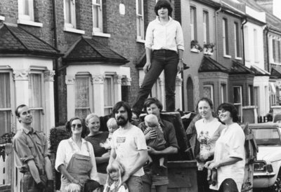 1982. Neighbours with a full skip of rubbish from the Crane