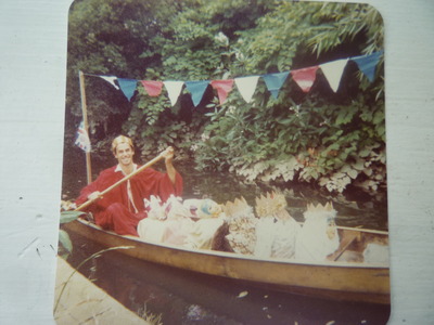 1st river clearing for 1977 jubilee. Adam Cade in decorated canoe. 