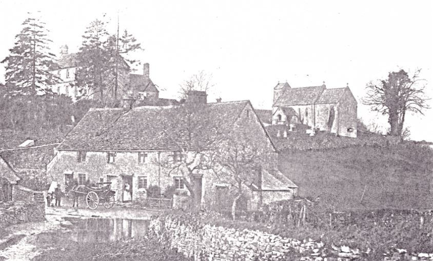 Duntisbourne Rous - early period photograph showing a row of traditional Cotswold cottages with horse and cart in the foreground and with St Michael's Church in the background