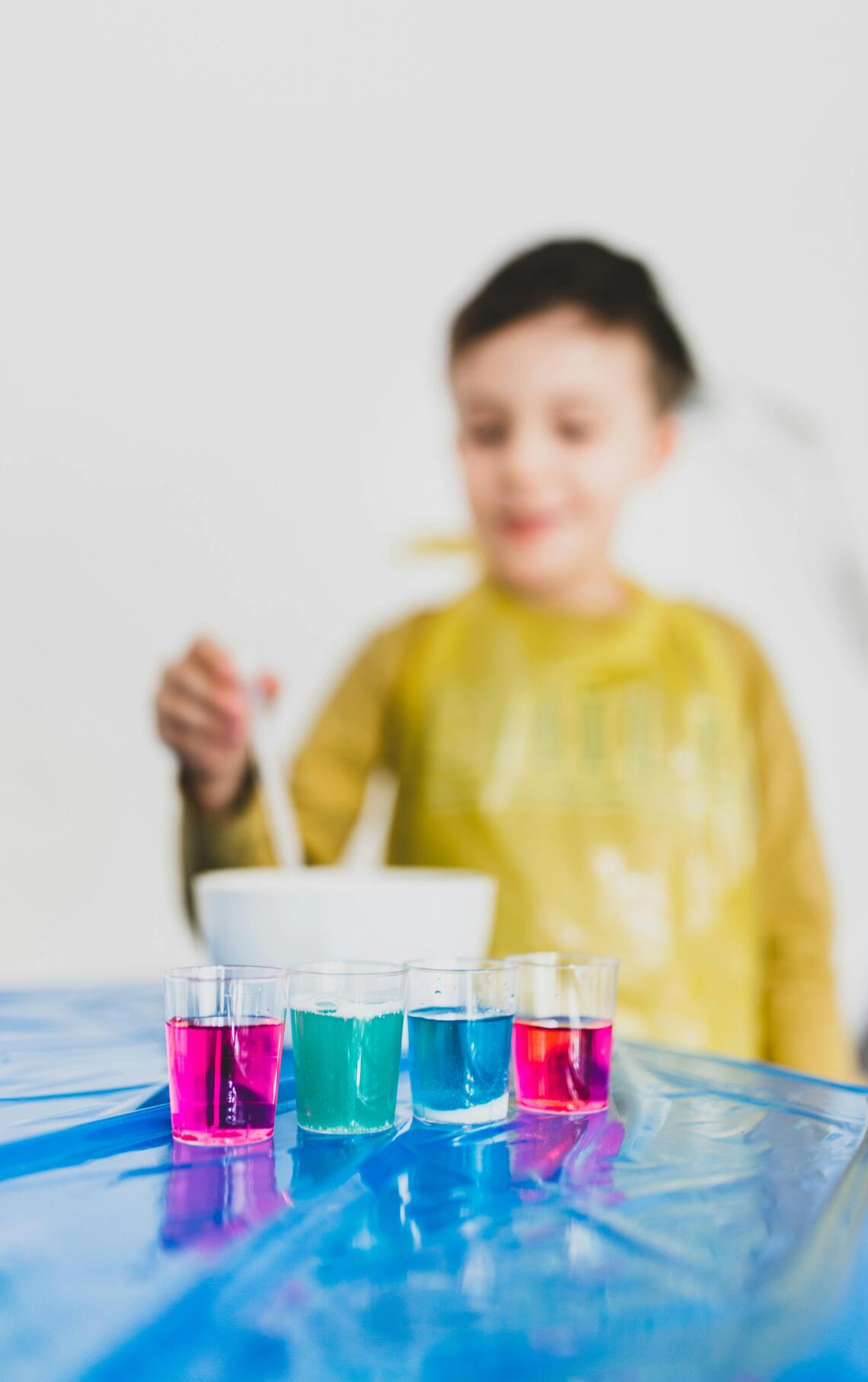 Child testing water quality