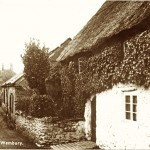 The Old Smithy and Cottage in the 1920s. Dated by English Heritage to the early 19th century, the smithy was awarded Grade II listed status in 1999. The blacksmith was a key member of the rural economy, and in this part of Wembury this role was fulfilled by successive members of the Coleman family. Little short of a dynasty, the Colemans handed the business down through the generations throughout the 19th century and well into the 20th. From the 1881 census it is clear that the family was significantly more prosperous than was typical, employing as they did two servants. Despite this prosperity, their cottage (foreground) was far from palatial, yet at times housed at ten or more occupants. By the time the smithy was listed both it and the cottage were deteriorating, but both were renovated in 2012 / 13 by Pam and Tony Bowring.
